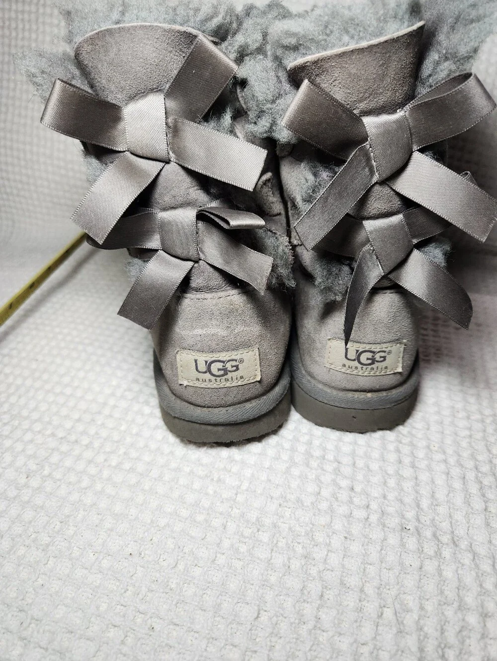UGG Gray Bow Back Shearling Boots Flawed